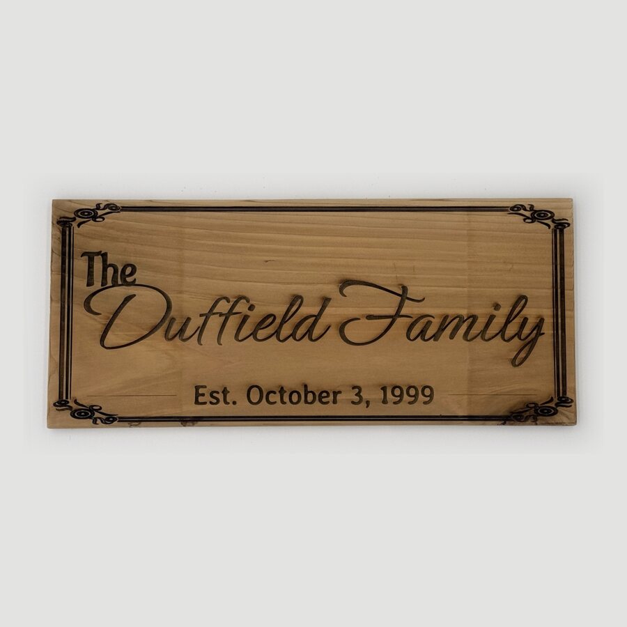 The Duffield Family cedar sign, established 1999